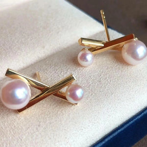 tasaki pearl earrings in 18k gold