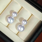 Load image into Gallery viewer, Carefully selected white South Sea pearls, produced by the silver-lipped oyster, are round
