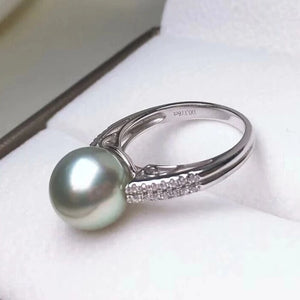 green and pearl ring