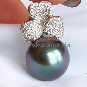 very bright tahitian pearl pendant with 18ct and diamond