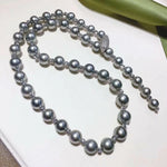 Load image into Gallery viewer, 24 Inch Matinee Length 8.0-11.0 mm Round Tahitian Silver Blue Pearl Rosary Necklace - takaramonobr
