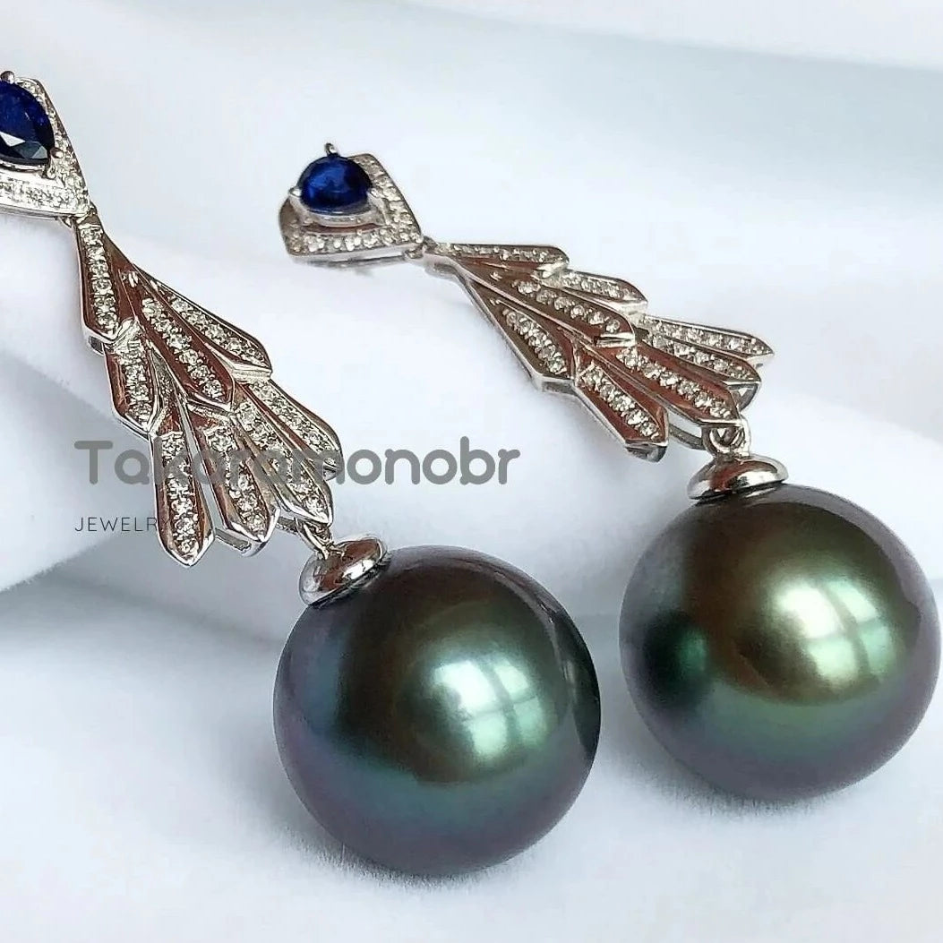 peacock pearl earrings in blue green color