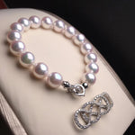 Load image into Gallery viewer, akoya pearl bracelet
