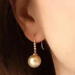 Load image into Gallery viewer, golden dangle earrings
