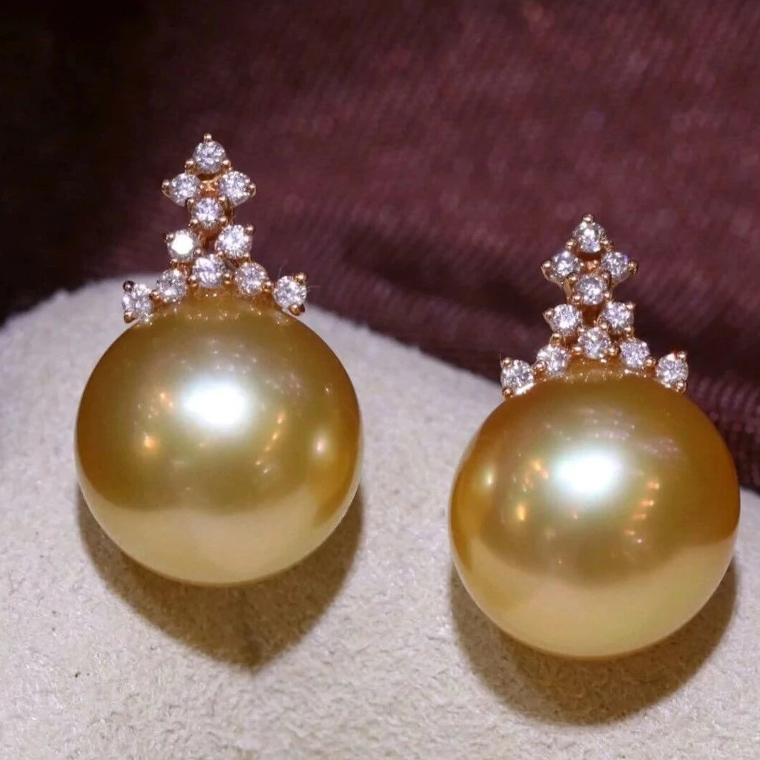 Gold and 2025 pearl studs