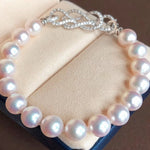 Load image into Gallery viewer, 7.5-8.0 mm White Akoya Pearl Bracelet &amp; Diamond in 18K Gold Clasp - takaramonobr
