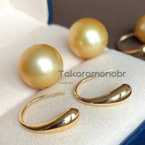 golden pearl statement earrings