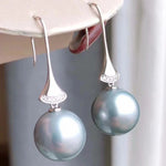 Load image into Gallery viewer, clean surface cultured pearl earrings
