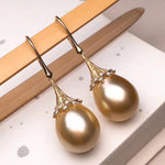 Load image into Gallery viewer, Umbrella Collection 14.0-15.0 mm Golden South Sea Pearl Dangle Earrings - takaramonobr
