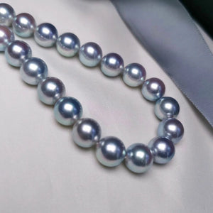 long pearl necklace with knot
