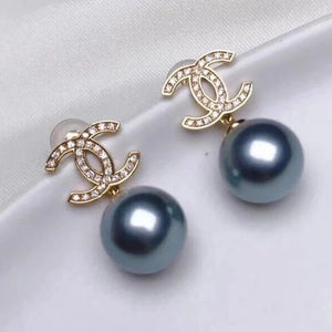 silver blue Tahitian pearl earrings with 18k gold and diamond