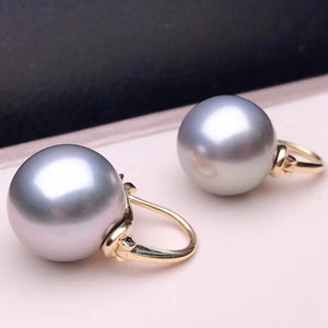 18k gold pearl stud earrings