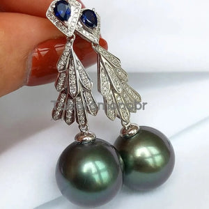 dangle earrings in 18ct and diamond