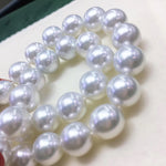 Load image into Gallery viewer, white south sea pearl strands earrings
