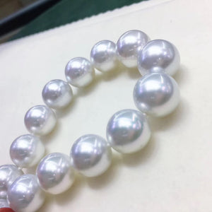 graduated white south sea pearl earrings 16 inch